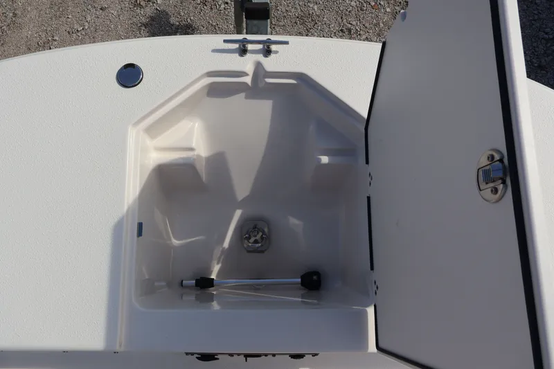 Slide: The Image of Interior view of 2023 Carolina Skiff 17 LS storage compartment. - 13