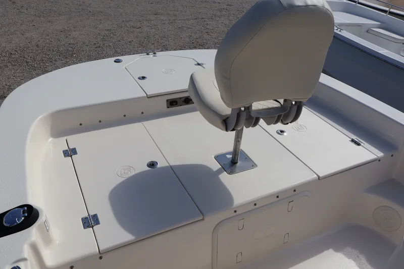 Slide: The Image of 2023 Carolina Skiff 17 LS boat seat and storage area. - 14