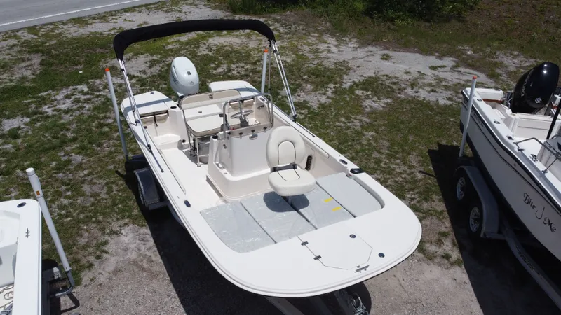Slide: The Image of 2023 Carolina Skiff 17 LS boat on a trailer, side view. - 3