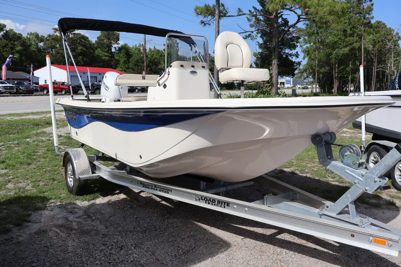 Slide: The Image of 2023 Carolina Skiff 17 LS boat on trailer, side view. - 4