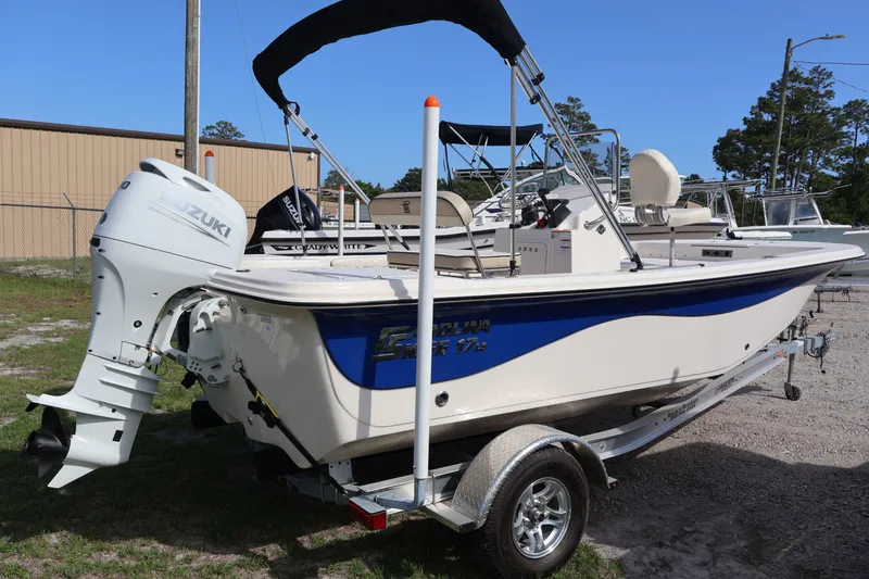 Slide: The Image of 2023 Carolina Skiff 17 LS boat with Suzuki outboard motor. - 8