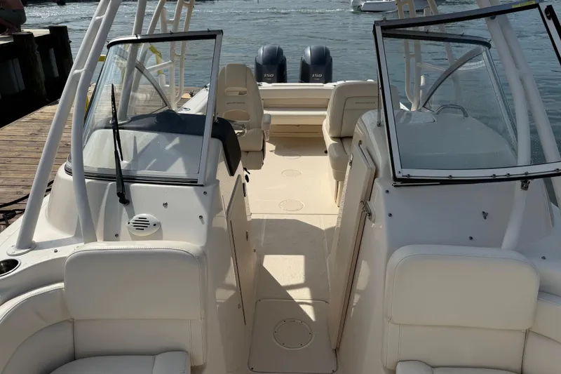 Slide: The Image of 2019 Grady-White Freedom 255 boat interior with dual consoles and seating. - 21