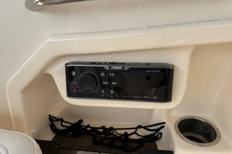 Slide: The Image of Fusion marine stereo on 2019 Grady-White Freedom 255 boat dashboard. - 31