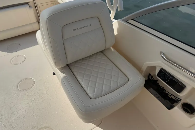 Slide: The Image of 2019 Grady-White Freedom 255 boat seat with quilted upholstery and integrated audio system. - 32