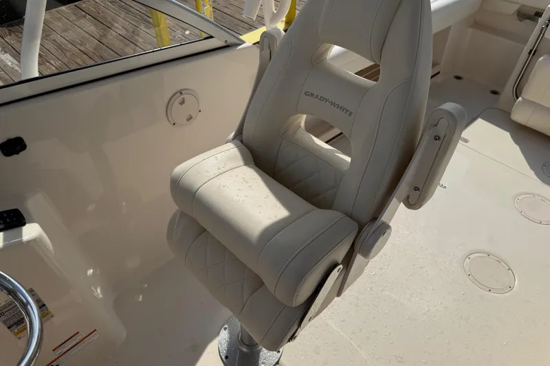 Slide: The Image of Grady-White Freedom 255 boat seat, 2019 model, with beige upholstery and armrests. - 33