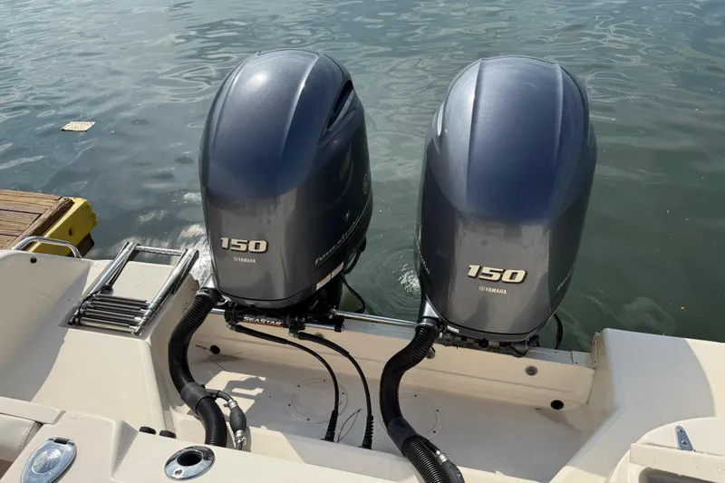 Slide: The Image of Twin Yamaha 150 outboard engines on a 2019 Grady-White Freedom 255 boat. - 38