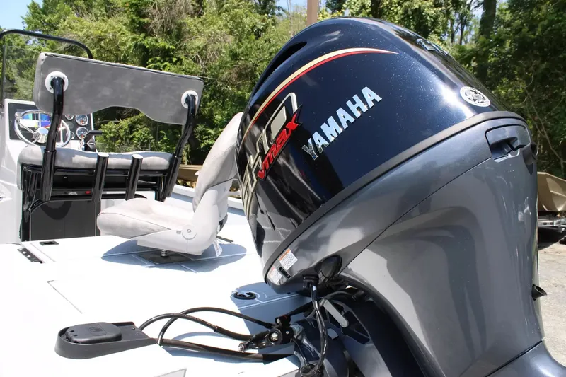 Slide: The Image of 2026 G3 Bay 21 GX boat with Yamaha outboard motor. - 13