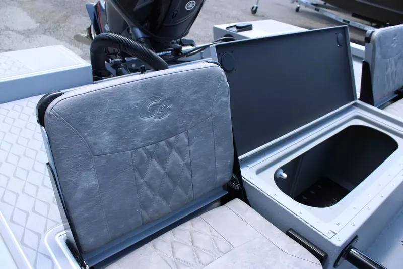 Slide: The Image of G3 Bay 21 GX 2026 boat seat with storage compartment. - 18