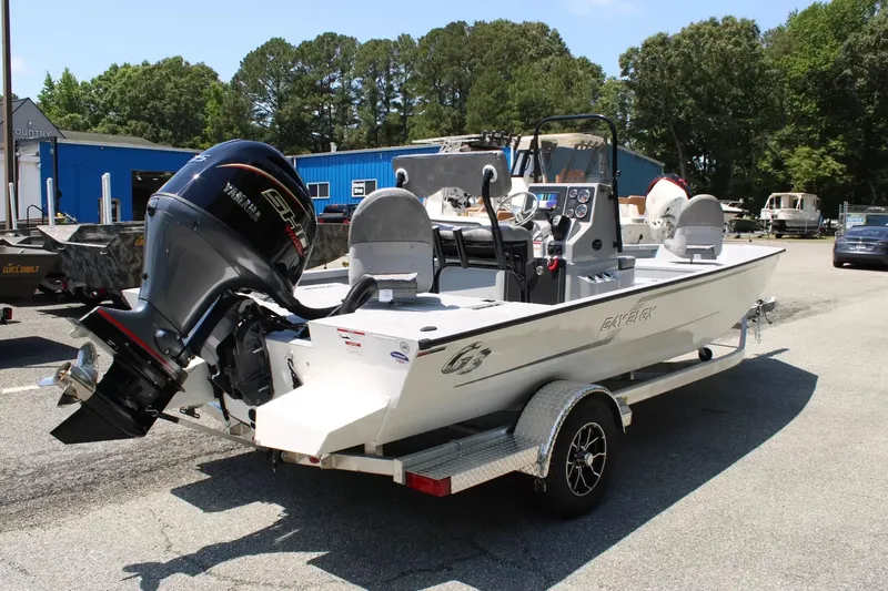 Slide: The Image of 2026 G3 Bay 21 GX boat on trailer outdoors. - 5