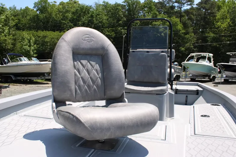 Slide: The Image of G3 Bay 21 GX boat with gray seat, 2026 model. - 9
