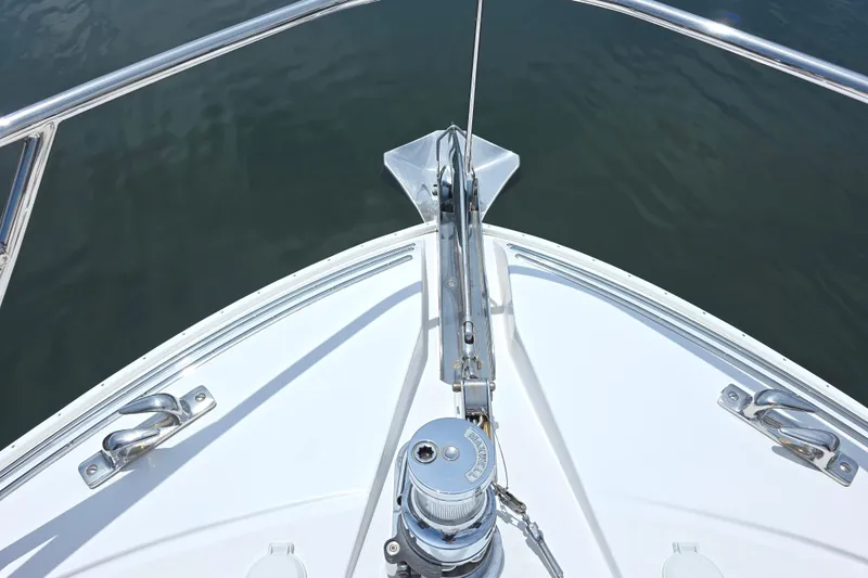 Slide: The Image of Bow view of 2008 Hatteras 64 Motor Yacht with anchor and railing details. - 17