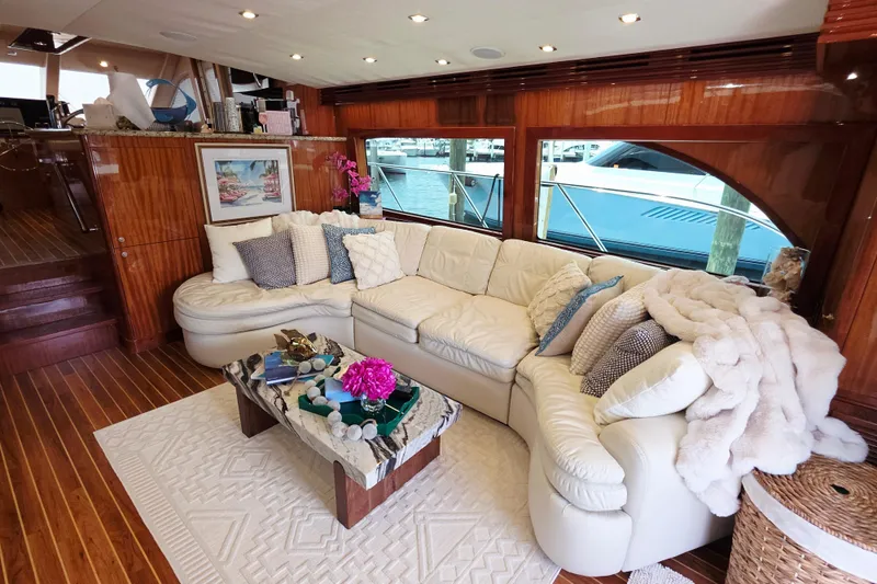 Slide: The Image of Luxurious interior of 2008 Hatteras 64 Motor Yacht with plush seating and elegant decor. - 22