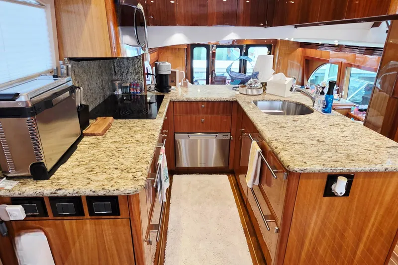 Slide: The Image of Luxurious kitchen interior of 2008 Hatteras 64 Motor Yacht with granite countertops. - 31