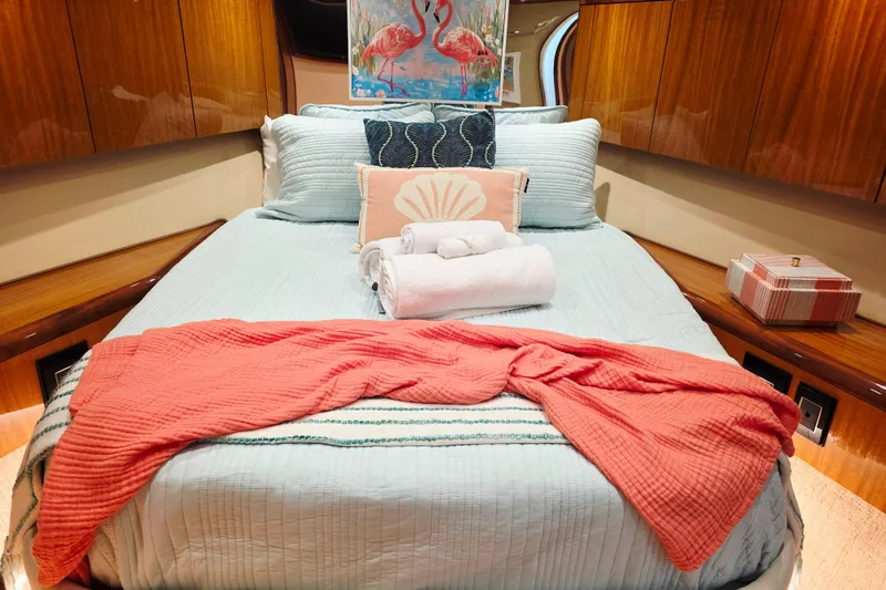 Slide: The Image of Luxurious bedroom interior of 2008 Hatteras 64 Motor Yacht with elegant bedding and decor. - 36