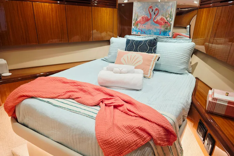 Slide: The Image of Luxurious bedroom interior of 2008 Hatteras 64 Motor Yacht with elegant bedding and decor. - 37