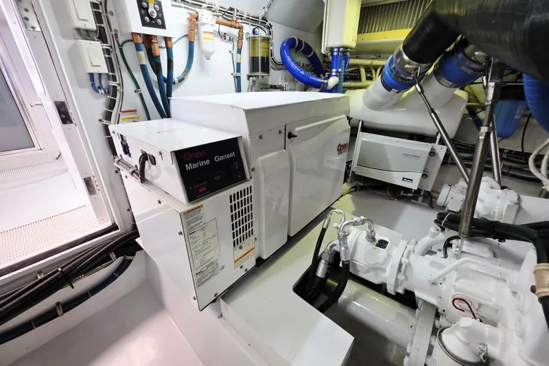 Slide: The Image of Engine room of 2008 Hatteras 64 Motor Yacht with Onan Marine Genset and Aqua Matic system. - 54