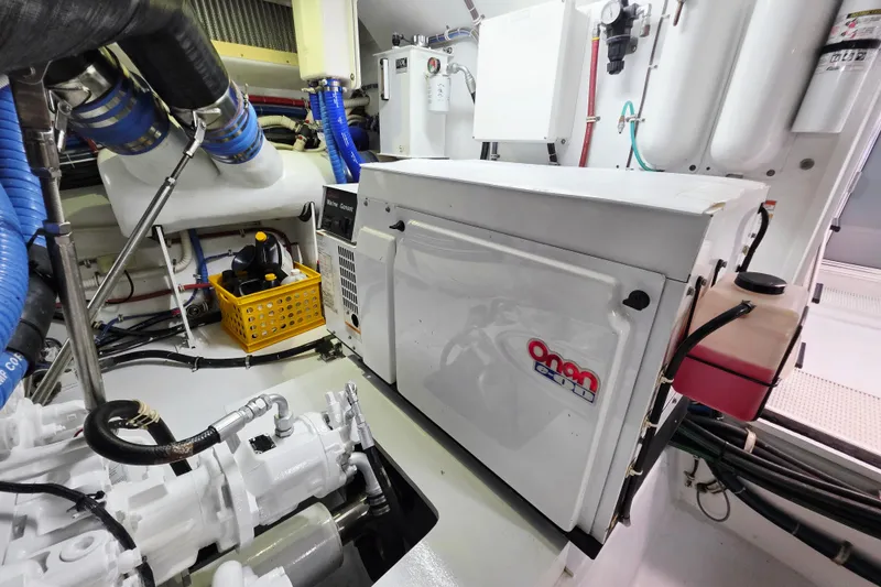 Slide: The Image of Engine room of 2008 Hatteras 64 Motor Yacht with Onan generator and equipment. - 55