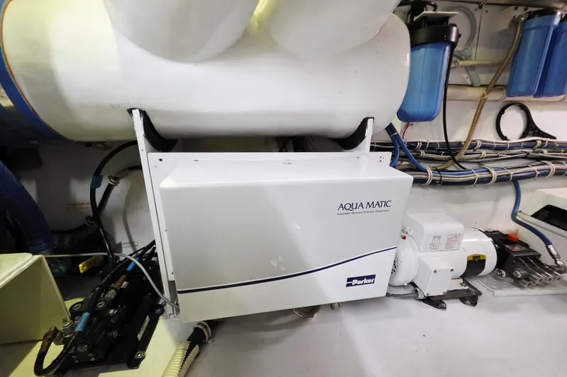Slide: The Image of Engine room of 2008 Hatteras 64 Motor Yacht with Aqua Matic watermaker system. - 56