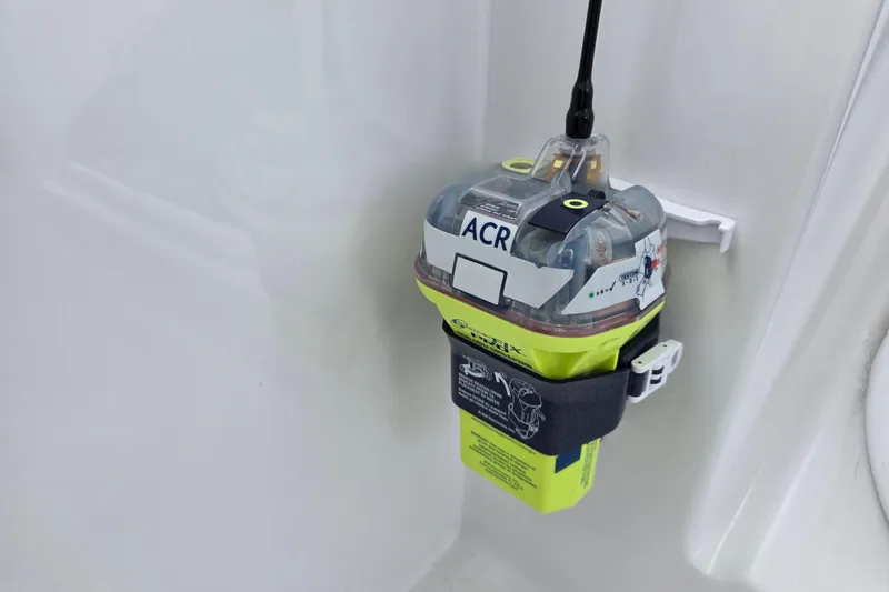Slide: The Image of Emergency beacon on 2008 Hatteras 64 Motor Yacht, mounted securely for safety. - 57