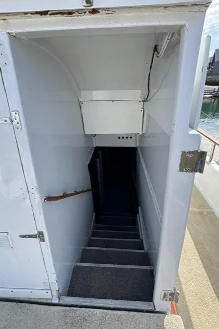 Slide: The Image of Stairway leading below deck on a 1966 Seaway Commercial Sportfish Vessel. - 17