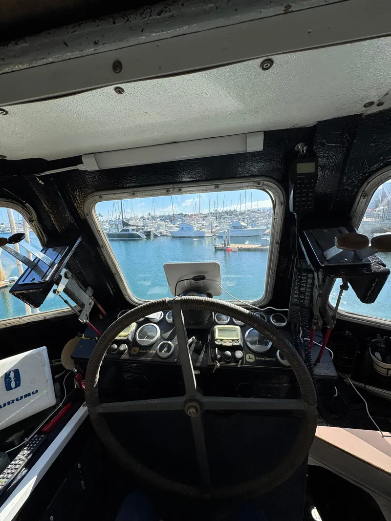 Slide: The Image of Interior view of 1966 Seaway Commercial Sportfish Vessel cockpit, overlooking marina. - 20