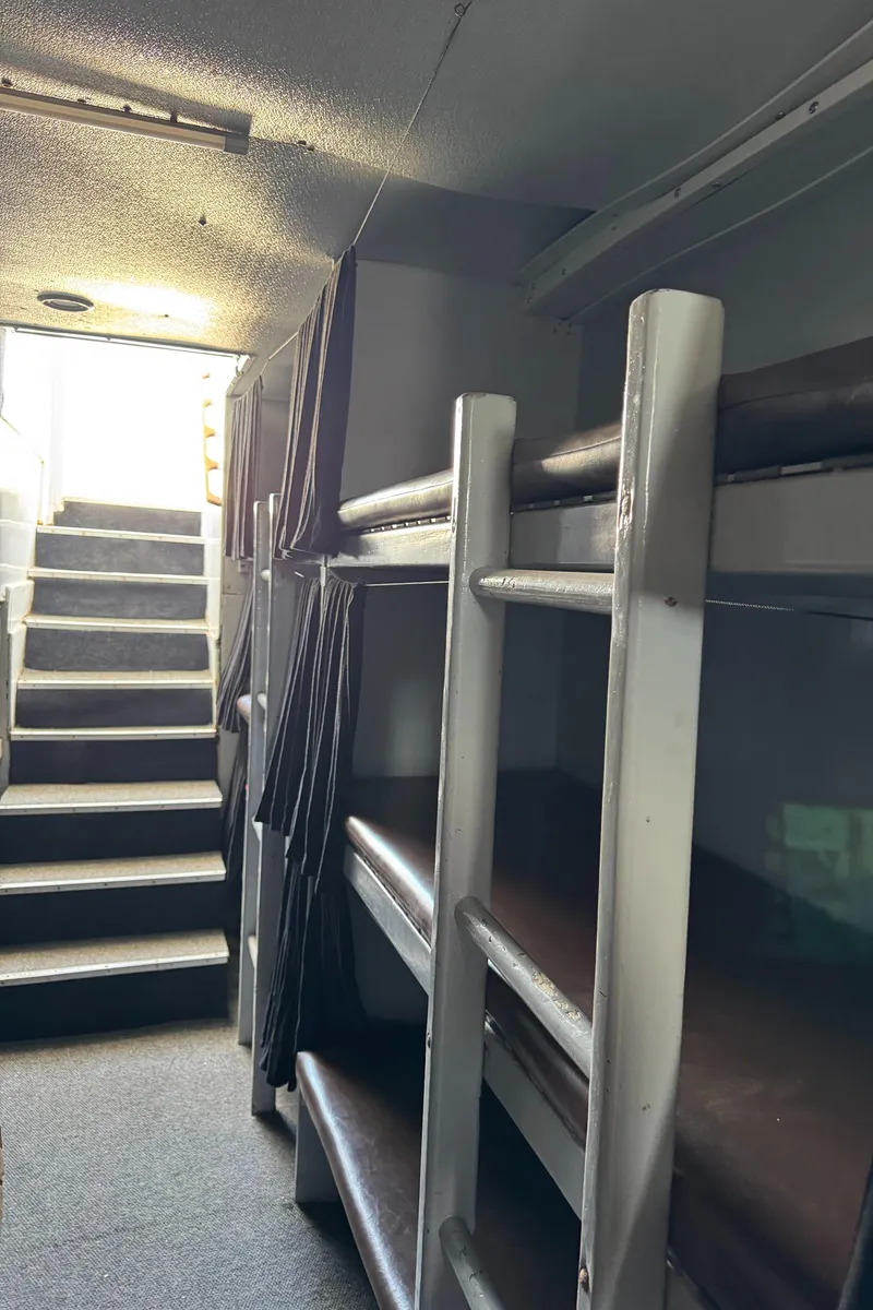 Slide: The Image of Interior of 1966 Seaway Commercial Sportfish Vessel with bunk beds and stairs. - 33