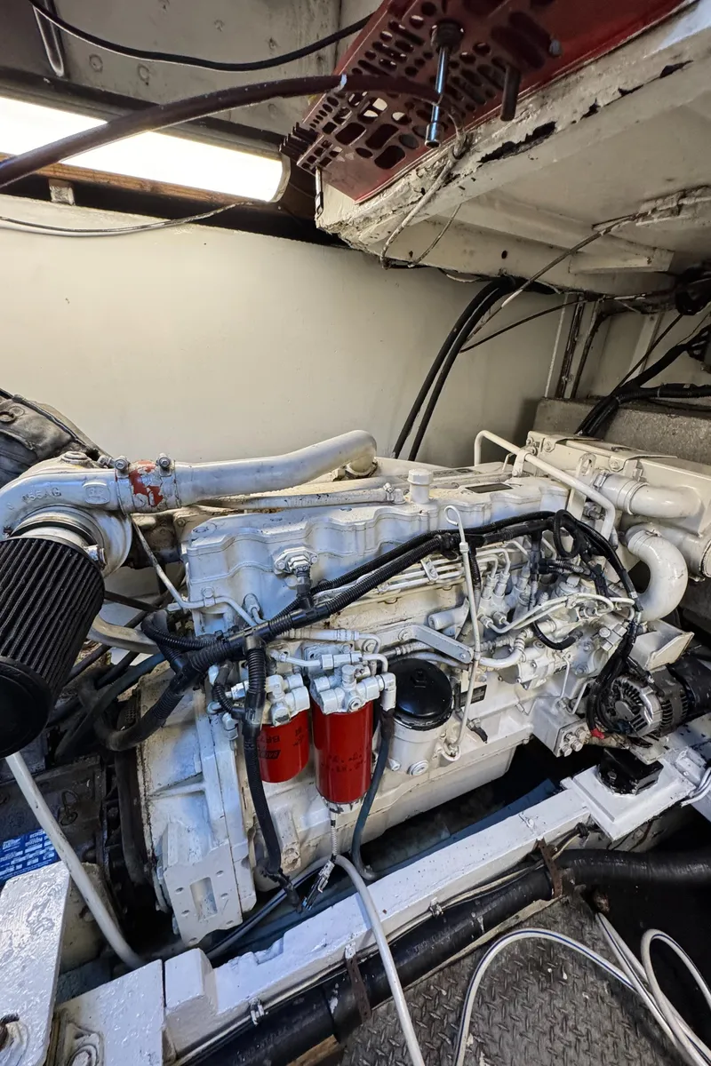 Slide: The Image of Engine room of a 1966 Seaway Commercial Sportfish Vessel, showcasing detailed machinery. - 37
