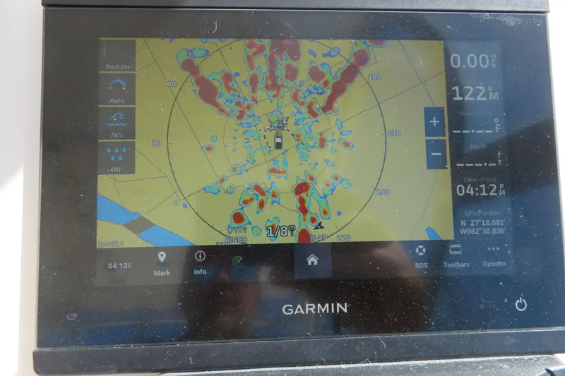 Slide: The Image of Garmin marine GPS display on 2017 Sea Fox 256 Voyager, showing navigation and radar data. - 36