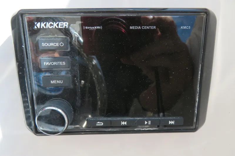 Slide: The Image of Kicker KMC5 media center on 2017 Sea Fox 256 Voyager boat dashboard. - 39