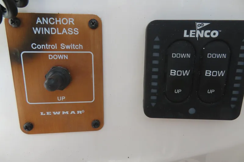 Slide: The Image of Control panel of a 2017 Sea Fox 256 Voyager with Lewmar and Lenco switches. - 40