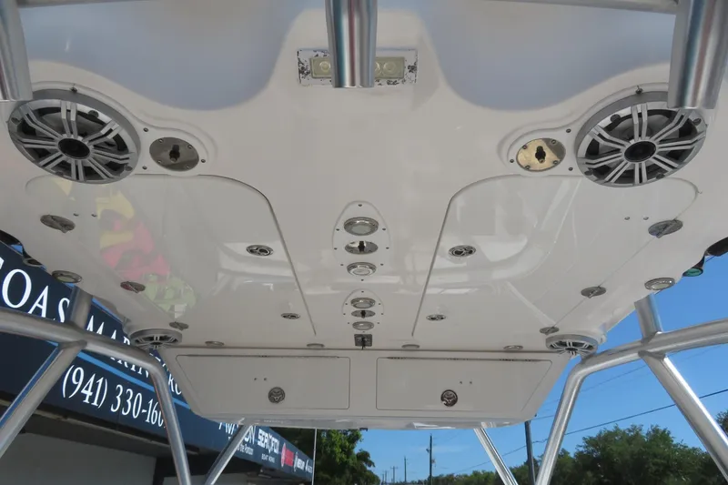 Slide: The Image of 2017 Sea Fox 256 Voyager boat roof with speakers and rod holders. - 44