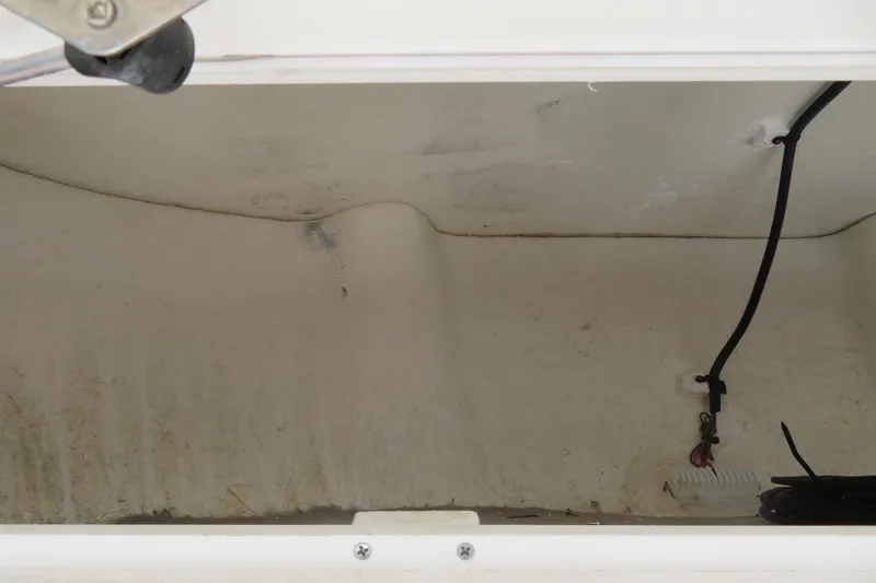 Slide: The Image of Storage compartment of a 2017 Sea Fox 256 Voyager boat, showing interior details. - 52