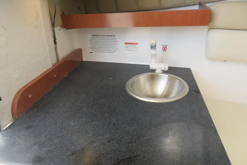 Slide: The Image of 2017 Sea Fox 256 Voyager boat interior with sink and countertop. - 67
