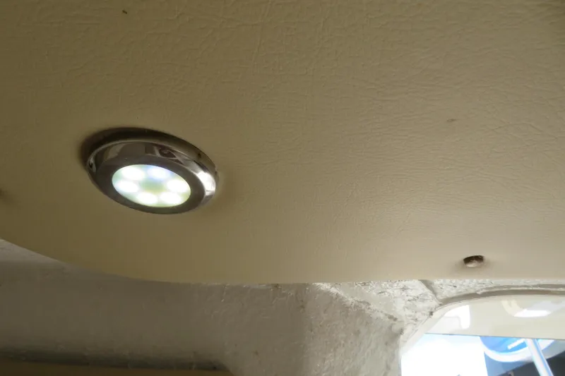 Slide: The Image of LED ceiling light inside a 2017 Sea Fox 256 Voyager boat. - 75