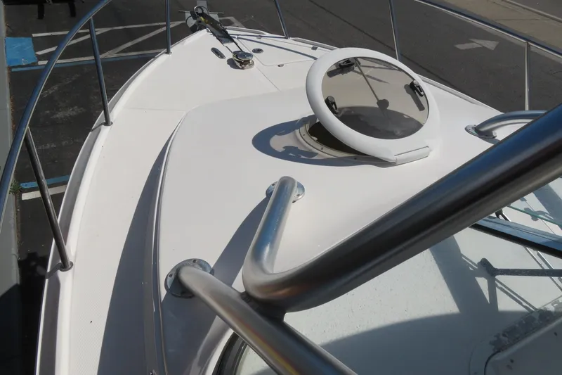 Slide: The Image of 2017 Sea Fox 256 Voyager boat deck with hatch and railing. - 79