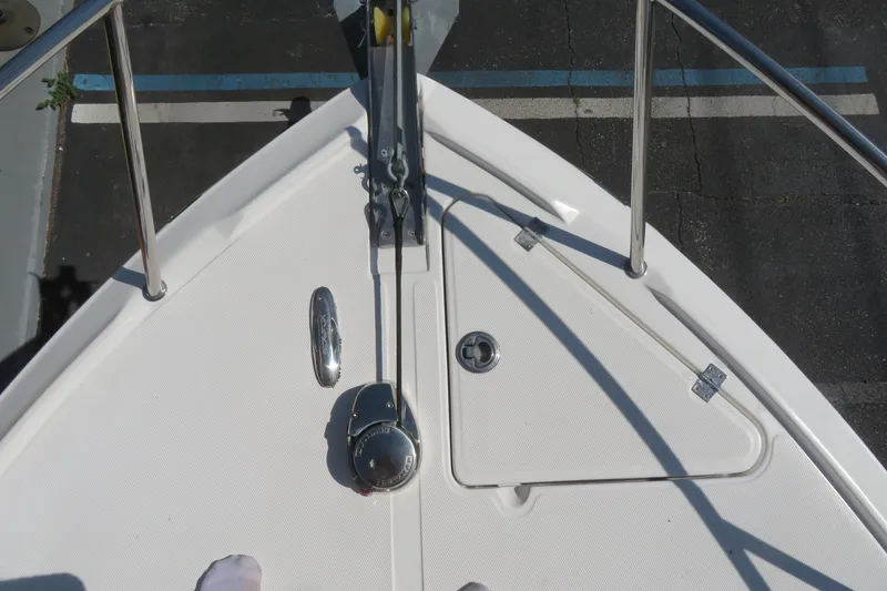 Slide: The Image of Bow view of 2017 Sea Fox 256 Voyager boat, featuring anchor and deck details. - 80