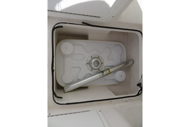 Slide: The Image of Storage compartment of 2017 Sea Fox 256 Voyager boat with equipment inside. - 86