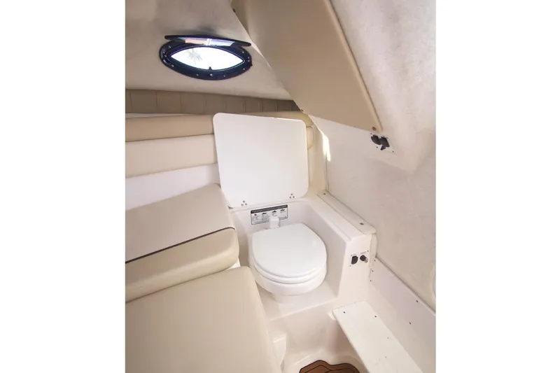 Slide: The Image of Manufacturer Provided Image: 2017 Sea Fox 256 Voyager cabin with toilet and seating area. - 97