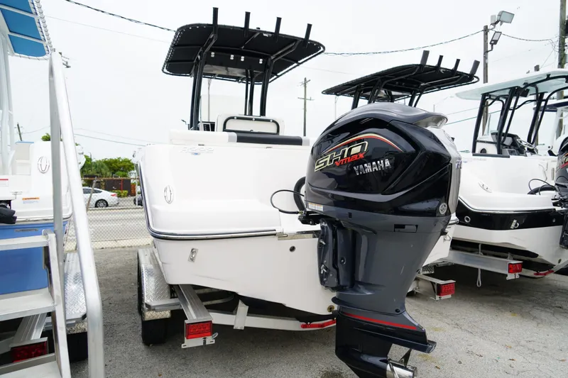 Slide: The Image of 2025 Robalo R222 Center Console boat with Yamaha engine on display. - 3