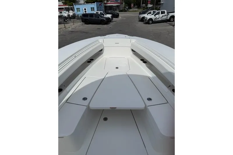 Slide: The Image of 2026 Regulator 31 boat deck with spacious seating and storage compartments. - 25