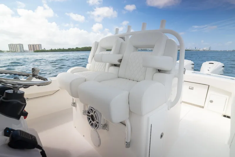 Slide: The Image of Luxurious seating on a 2026 Regulator 31 boat, with ocean view and modern design. - 8