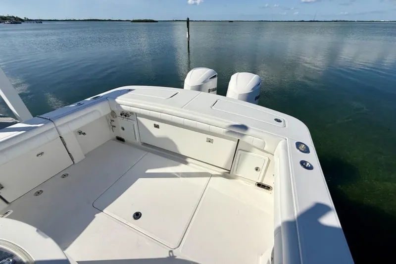 Slide: The Image of 2019 Regulator 31 boat with dual engines on calm water. - 17