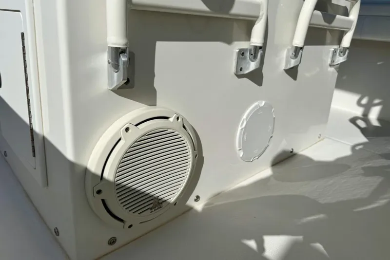 Slide: The Image of 2019 Regulator 31 boat interior with speaker and rod holders. - 30