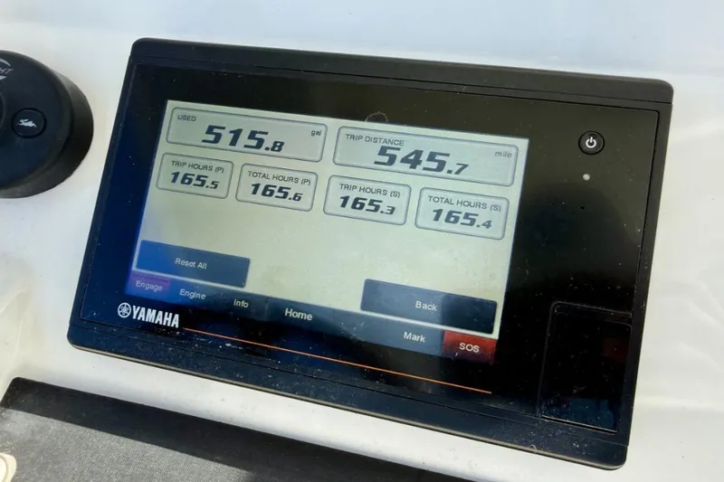 Slide: The Image of Yamaha display showing fuel usage and trip data on a 2019 Regulator 31 boat. - 39
