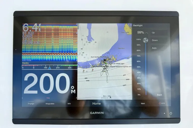 Slide: The Image of Garmin marine display on 2019 Regulator 31, showing sonar and navigation data. - 40