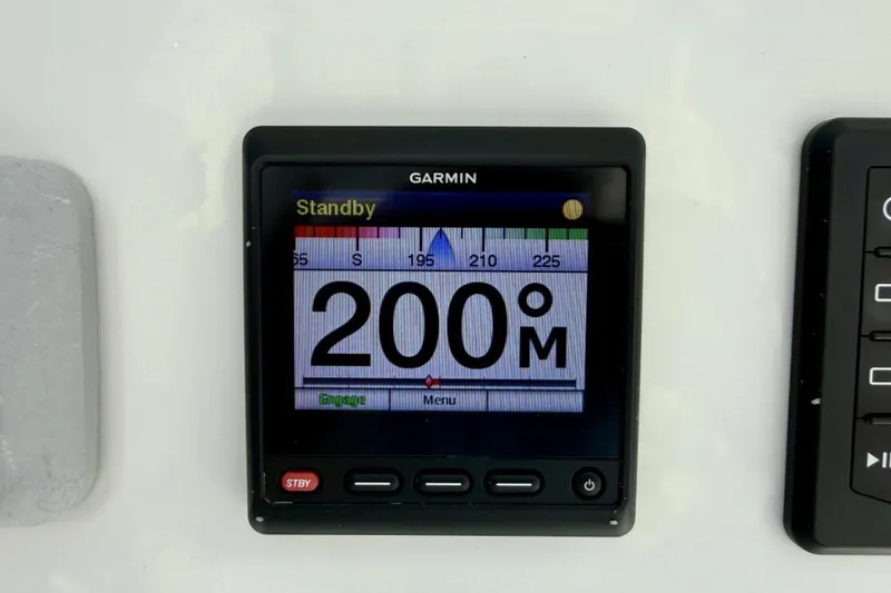 Slide: The Image of Garmin marine display on 2019 Regulator 31 boat, showing 200 meters in standby mode. - 42