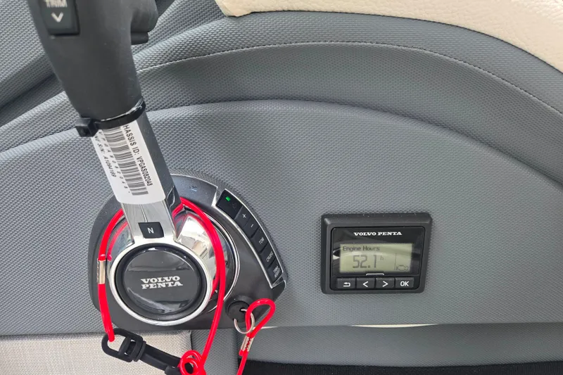Slide: The Image of 2020 Cobalt R7 Surf boat dashboard with Volvo Penta controls and engine hours display. - 13