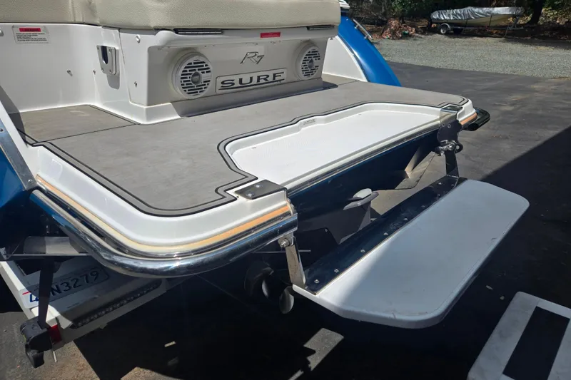 Slide: The Image of 2020 Cobalt R7 Surf boat swim platform with speaker and step ladder. - 15