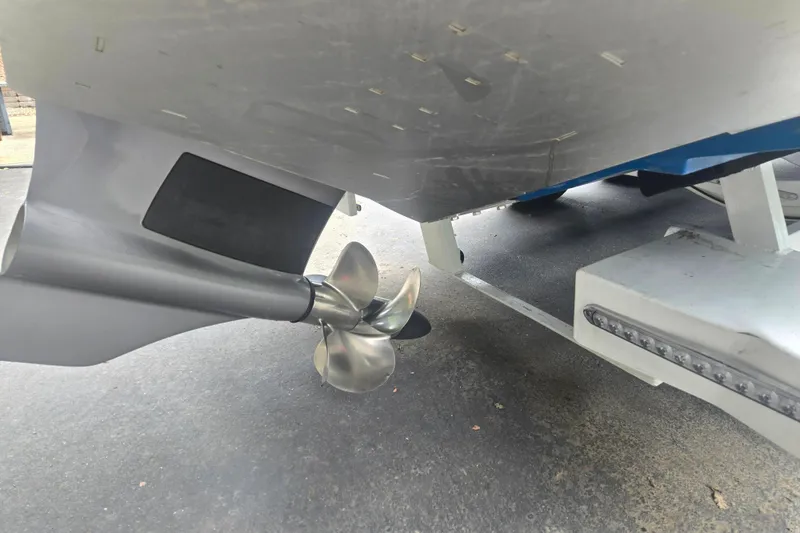 Slide: The Image of 2020 Cobalt R7 Surf boat propeller and hull on trailer. - 3
