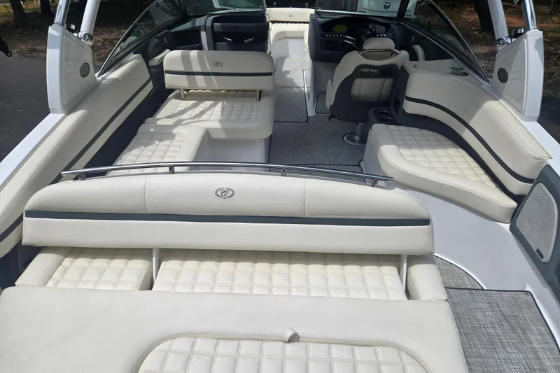 Slide: The Image of 2020 Cobalt R7 Surf boat interior with luxurious white seating and modern design. - 6